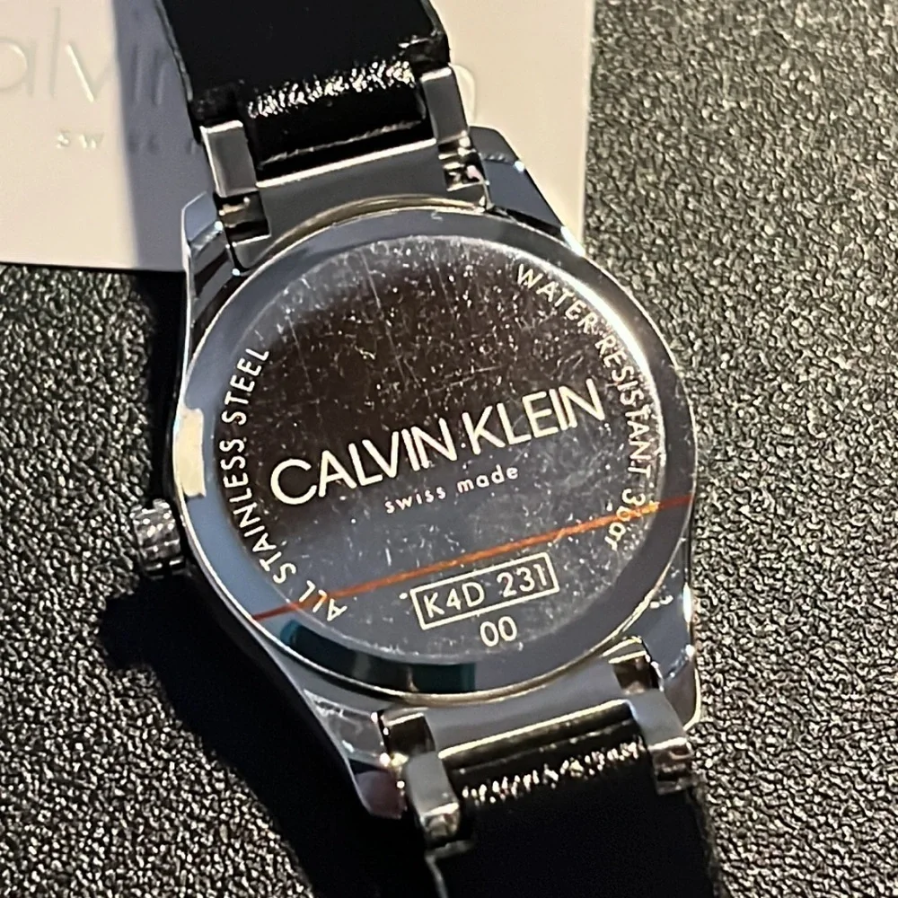 NWT Calvin Klein Swiss made women’s watch with black leather band